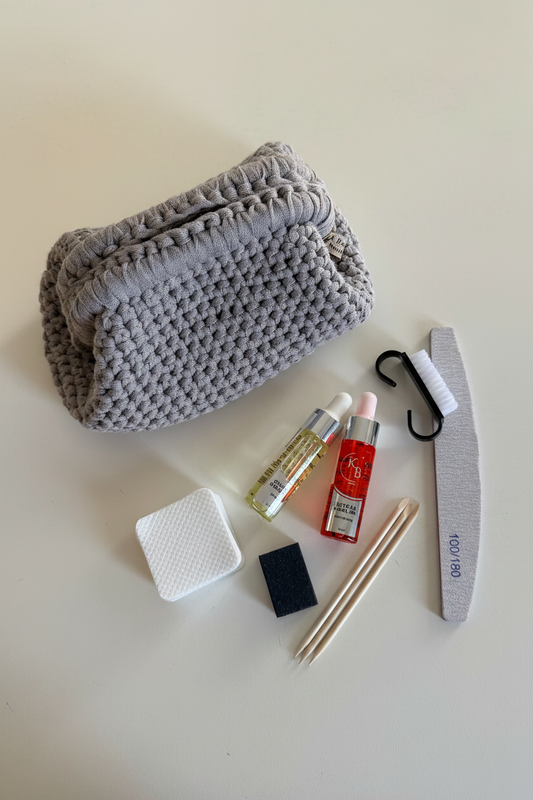 Grey pouch flat lay – studio